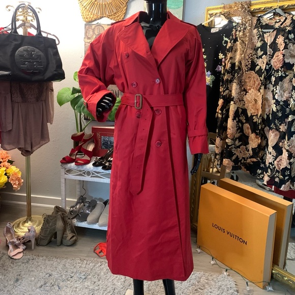 Red Burberry (previously Burberry’s) trench coat